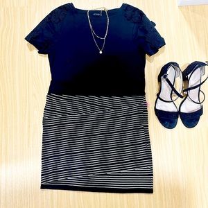 Xhilaration black and white stripped miniskirt in size medium. New with tags